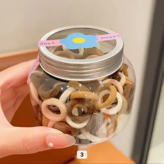 מארז גומיות בד במיכל אחסון